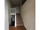 Welcoming entryway with staircase leading to the second floor and wood flooring at 3413 Creekview Dr, Rex, GA 30273