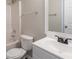 Bright bathroom featuring a shower-tub combo and a modern vanity with a large mirror at 4205 Post Oak Grv, Atlanta, GA 30349
