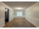 Dining room featuring wainscoting and a window providing natural light at 4205 Post Oak Grv, Atlanta, GA 30349