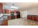 Functional kitchen showcasing modern appliances and wood cabinets at 4205 Post Oak Grv, Atlanta, GA 30349