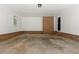 Spacious unfinished basement, offering a large open space for flexible use and storage at 546 Wagon Wheel Climb, Lawrenceville, GA 30044