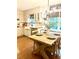 Eat-in kitchen with breakfast nook table, and modern chandelier at 546 Wagon Wheel Climb, Lawrenceville, GA 30044