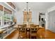 Bright dining area with natural light and wood floors at 546 Wagon Wheel Climb, Lawrenceville, GA 30044