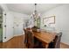 Charming dining area with hardwood floors and decorative chandelier at 546 Wagon Wheel Climb, Lawrenceville, GA 30044