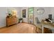 Functional home office with natural light, hardwood floors and door to the backyard at 546 Wagon Wheel Climb, Lawrenceville, GA 30044