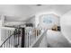 Spacious bonus room with lots of natural light and carpeted floors at 6095 Wayfarer Dr, Villa Rica, GA 30180