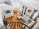 Aerial view of open living room featuring hardwood floors and modern decor at 6095 Wayfarer Dr, Villa Rica, GA 30180