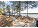 Picturesque waterfront restaurant with outdoor seating, offering stunning lake views at 6095 Wayfarer Dr, Villa Rica, GA 30180