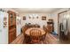 Traditional dining room with a wooden table, chandelier, and built-in cabinet at 127 Stagecoach Trl, Stockbridge, GA 30281