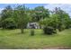 Serene property with mature trees surrounding a lovely two-story home at 127 Stagecoach Trl, Stockbridge, GA 30281