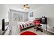 Bedroom with a large window, a computer and a red gaming chair at 236 Bobbie Way, Woodstock, GA 30189
