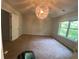Bright bedroom with a large window offering a view of the outside at 236 Bobbie Way, Woodstock, GA 30189