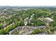 Scenic aerial view of townhome nestled within a lush, green neighborhood near downtown at 44 Saint Claire Ne Ln, Atlanta, GA 30324