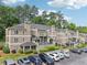 Townhouse complex with well-kept grounds and ample parking, providing a comfortable and convenient living environment at 44 Saint Claire Ne Ln, Atlanta, GA 30324