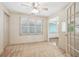 Office area with neutral walls, carpet, fan and natural lighting at 44 Saint Claire Ne Ln, Atlanta, GA 30324
