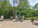 Outdoor patio area complete with seating and a table, ideal for enjoying the fresh air and outdoor living at 44 Saint Claire Ne Ln, Atlanta, GA 30324