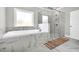 A neutral bathroom boasting a tub with marble tile surround and a large glass shower with marble and tile accents at 5003 Fairview Cir, Villa Rica, GA 30180