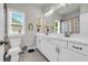 Bright bathroom features double sinks and plenty of storage at 5003 Fairview Cir, Villa Rica, GA 30180