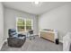 Bright bedroom with a large window and furniture at 5003 Fairview Cir, Villa Rica, GA 30180