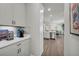 Butler's pantry features a coffee bar with white cabinets and countertops at 5003 Fairview Cir, Villa Rica, GA 30180
