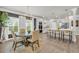 Bright eat-in kitchen features stainless appliances, pendant lighting, and a cozy breakfast nook with decorative chandelier at 5003 Fairview Cir, Villa Rica, GA 30180