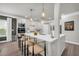 Kitchen with breakfast bar, stainless steel appliances, and white cabinets and countertops at 5003 Fairview Cir, Villa Rica, GA 30180