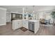 Open-concept kitchen with stainless steel appliances, center island, and eat-in breakfast nook at 5003 Fairview Cir, Villa Rica, GA 30180