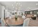 Open-concept living space showcasing dining area, living room, and kitchen with elegant decor at 5003 Fairview Cir, Villa Rica, GA 30180