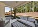 Screened-in patio features comfortable seating and a beautiful view at 5003 Fairview Cir, Villa Rica, GA 30180