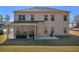 The back of the house shows a spacious screened porch and lawn at 5003 Fairview Cir, Villa Rica, GA 30180