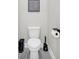A half bathroom showcasing a modern toilet, flooring, and a minimalist design at 5003 Fairview Cir, Villa Rica, GA 30180