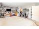 Bright, large bedroom featuring sports memorabilia, walk-in closet, and comfortable layout at 6450 Ivey Se Rd, Mableton, GA 30126