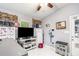 Multipurpose room with ceiling fan, entertainment center, and plenty of space at 6450 Ivey Se Rd, Mableton, GA 30126