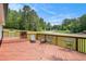 Spacious outdoor deck with seating, perfect for entertaining or enjoying the view at 6450 Ivey Se Rd, Mableton, GA 30126