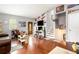 Cozy living room with hardwood floors, a staircase, and plenty of natural light at 6450 Ivey Se Rd, Mableton, GA 30126
