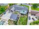 A beautiful home with a grey metal roof, gorgeous landscaping, backyard deck, pool, and outdoor living at 2668 Galahad Ne Dr, Atlanta, GA 30345