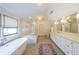 Luxurious bathroom with soaking tub, walk-in shower, and double vanity with lots of storage at 2668 Galahad Ne Dr, Atlanta, GA 30345