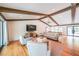 Inviting living room showcasing hardwood floors, beamed ceilings, and an open-concept layout at 2668 Galahad Ne Dr, Atlanta, GA 30345