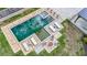 Backyard pool featuring unique outdoor design with hot tub, lounge area, fire pit, and manicured landscaping at 2668 Galahad Ne Dr, Atlanta, GA 30345