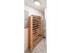 Functional wine storage area with wooden rack and tiled floor, perfect for wine enthusiasts at 2668 Galahad Ne Dr, Atlanta, GA 30345
