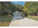 Well-kept single story home, large front yard and a concrete driveway at 45 Park Place Dr, Covington, GA 30016