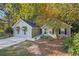 Well maintained exterior with pristine lawn and concrete driveway at 45 Park Place Dr, Covington, GA 30016