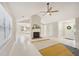 Open concept living room with fireplace and plenty of light at 45 Park Place Dr, Covington, GA 30016