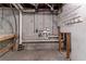 Unfinished basement displaying exposed piping and cinder block walls, ready for renovation at 5340 The Savoy St, Atlanta, GA 30349