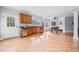 Basement bar area with stainless steel fridge and lots of windows at 401 Nichols Dr, Suwanee, GA 30024