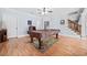 Finished basement game room with a pool table and access to an upper level at 401 Nichols Dr, Suwanee, GA 30024