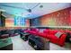 Unique karaoke room with custom lighting and red couches at 401 Nichols Dr, Suwanee, GA 30024