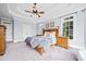 Spacious main bedroom featuring natural light and soft textures at 401 Nichols Dr, Suwanee, GA 30024