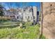 Large backyard with a deck, patio furniture, and well-maintained landscaping at 491 Princeton Ne Way, Atlanta, GA 30307