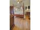 Spacious bedroom with a four-poster bed, hardwood floors, and classic design at 491 Princeton Ne Way, Atlanta, GA 30307